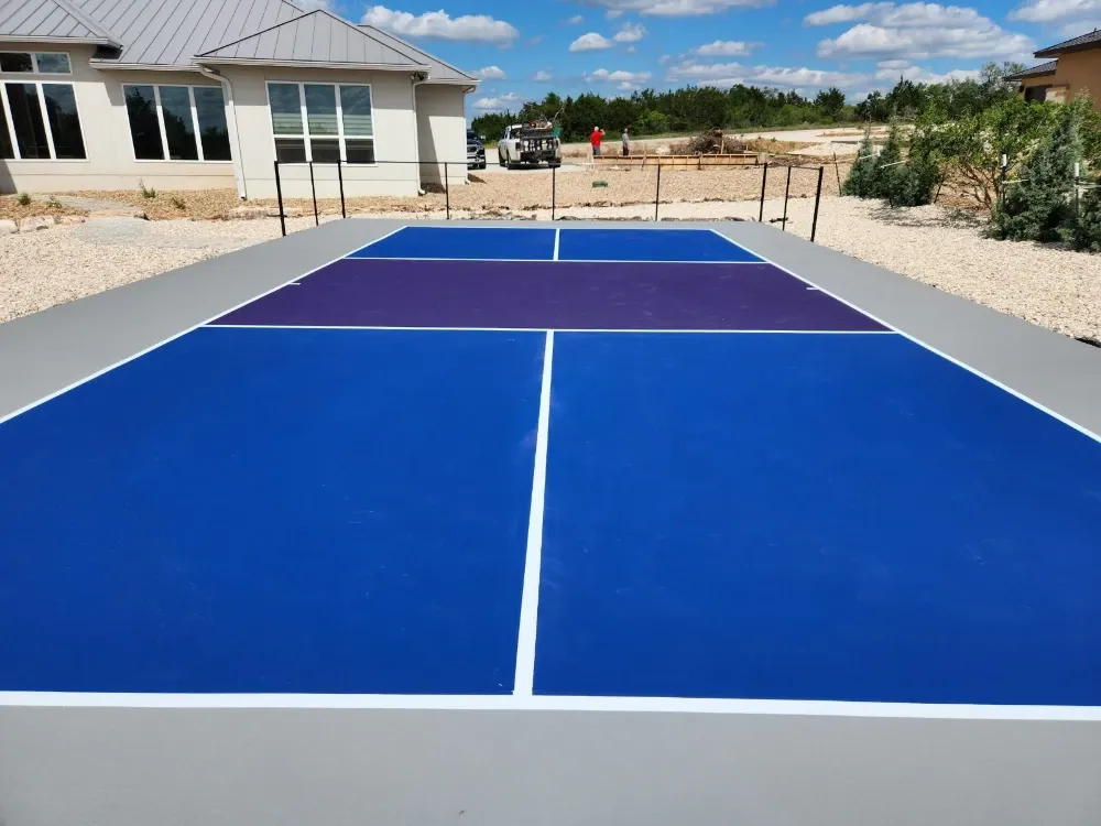 Finished purple and blue backyard court