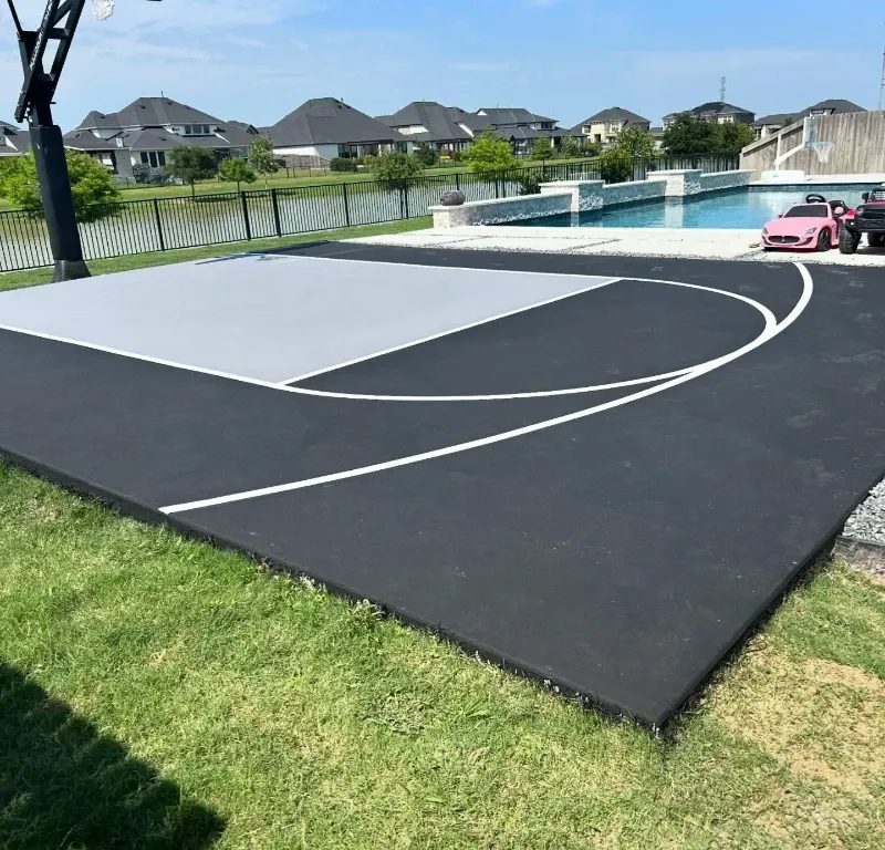 Black multi-sport game court by a pool